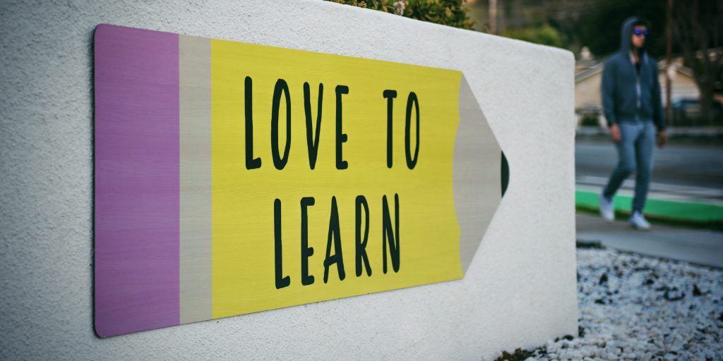 sign saying love to learn