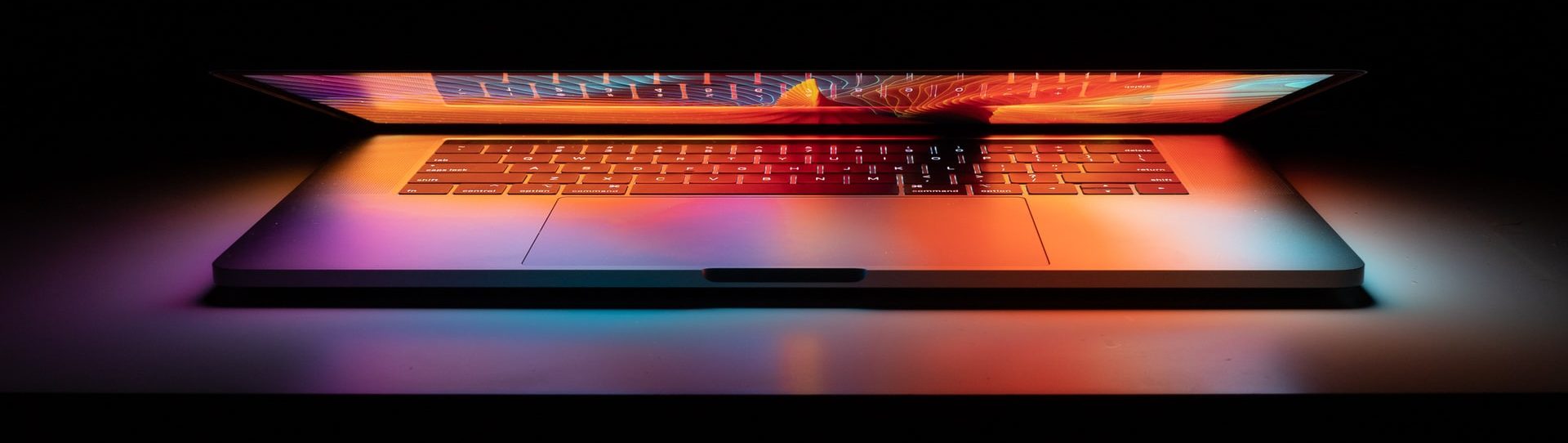 Laptop computer on black background